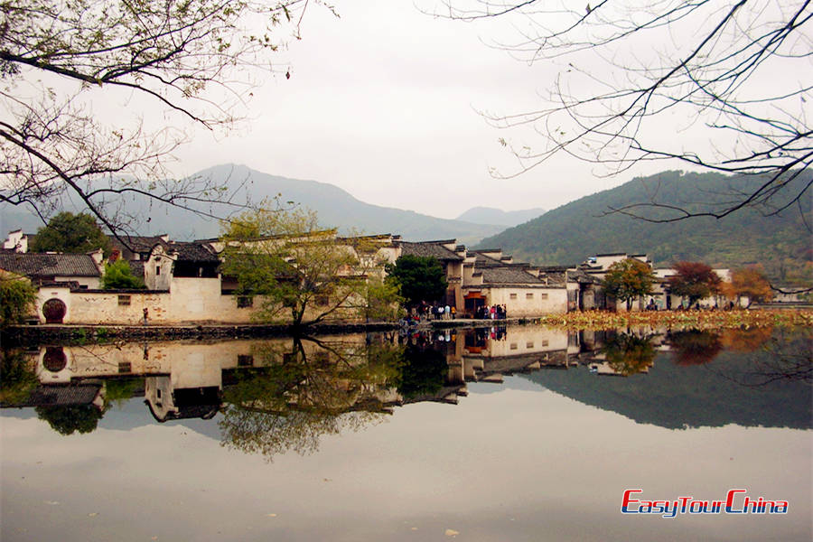 Visit Hongcun village and see the old structures reflected on the lake