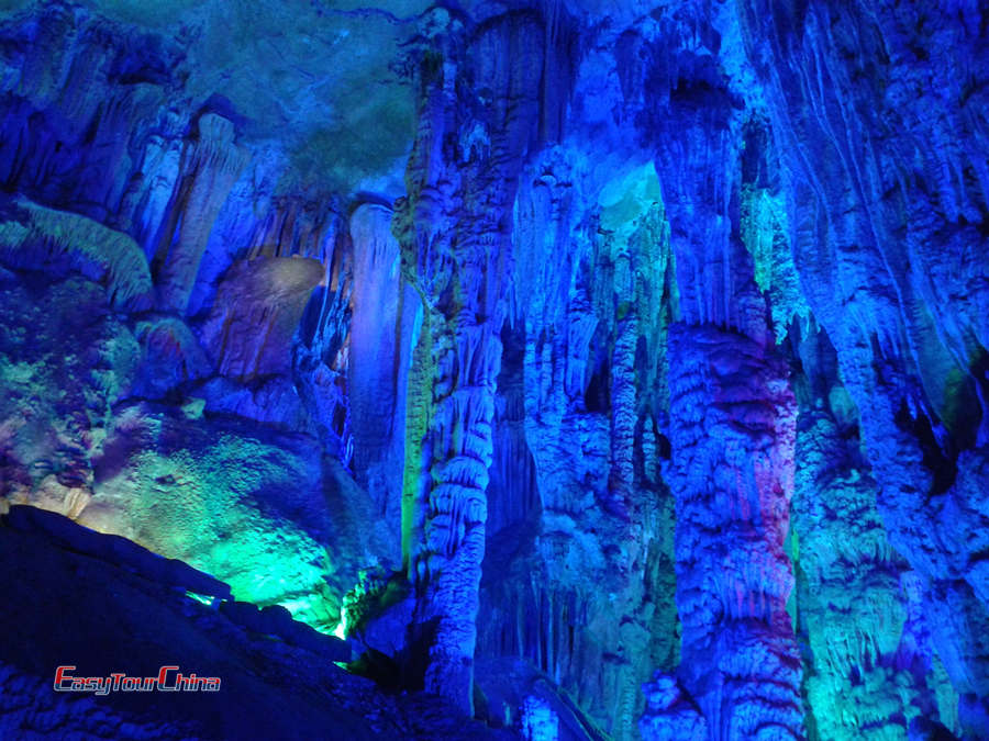 The stalactite at Reed Flute Cave illumiated