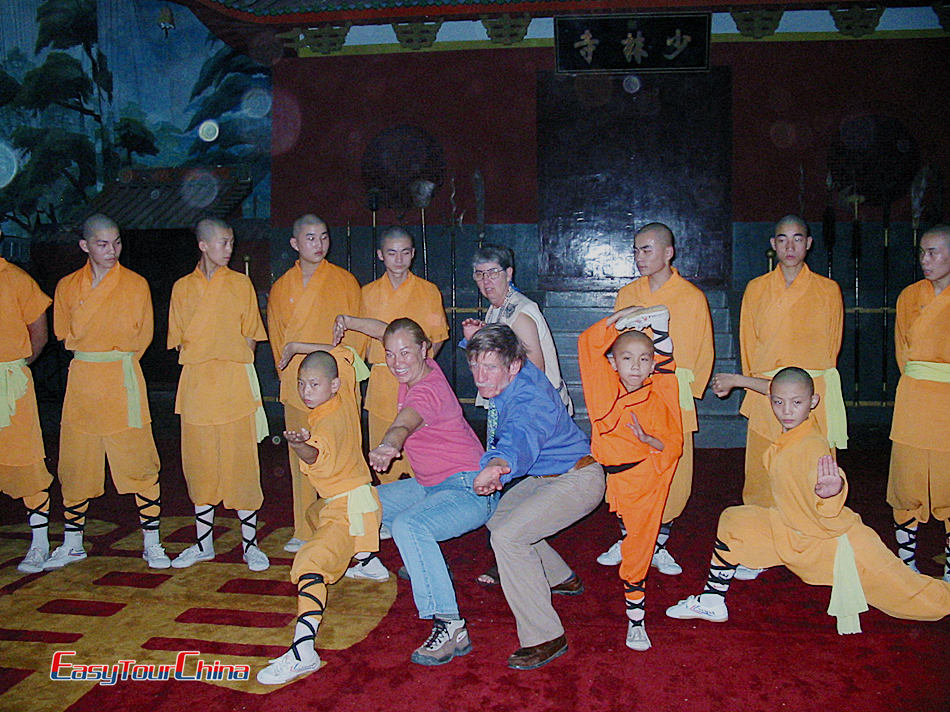 Clients take photo with Shaolin masters